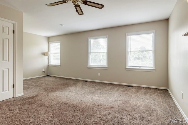 17560 Old Jamestown Rd, Florissant, MO 63034 - spare room with carpet, a ceiling fan, and baseboards