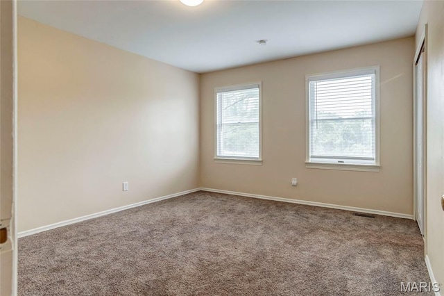 17560 Old Jamestown Rd, Florissant, MO 63034 - spare room with carpet floors and baseboards