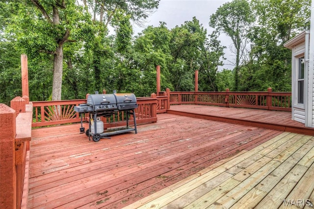 17560 Old Jamestown Rd, Florissant, MO 63034 - wooden terrace featuring a grill and view of scattered trees