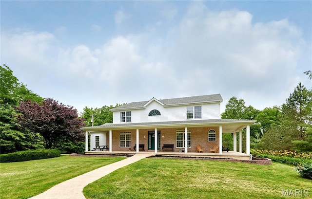4 Hahn Estates Rd, Winfield, MO 63389 - country-style home with a porch, a front yard, and brick siding