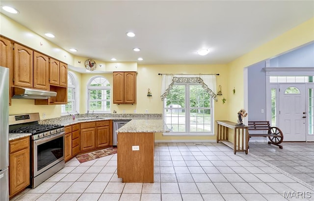 4 Hahn Estates Rd, Winfield, MO 63389 - kitchen featuring stainless steel appliances, under cabinet range hood, a peninsula, recessed lighting, and light stone counters