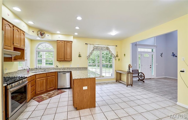 4 Hahn Estates Rd, Winfield, MO 63389 - kitchen featuring appliances with stainless steel finishes, healthy amount of natural light, recessed lighting, and light stone counters