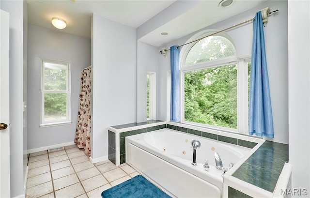 4 Hahn Estates Rd, Winfield, MO 63389 - full bath featuring a jetted tub and tile patterned floors