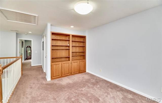 4 Hahn Estates Rd, Winfield, MO 63389 - empty room featuring light carpet and recessed lighting