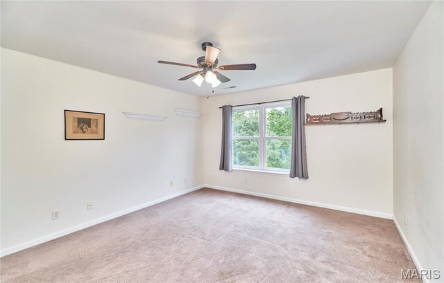4 Hahn Estates Rd, Winfield, MO 63389 - carpeted spare room with a ceiling fan and baseboards