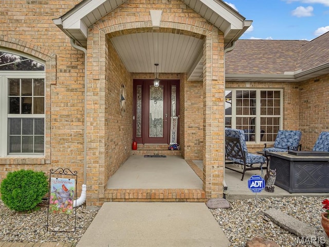 4184 Red Field Dr, Swansea, IL 62226 - doorway to property with brick siding and roof with shingles