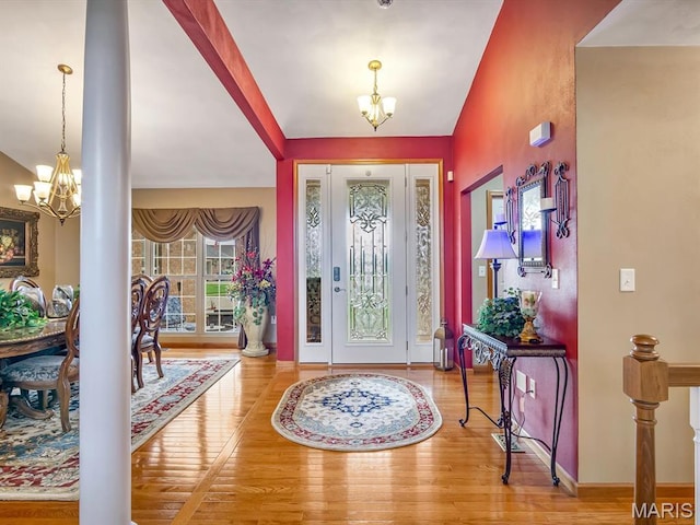 4184 Red Field Dr, Swansea, IL 62226 - foyer with a chandelier, wood finished floors, and vaulted ceiling
