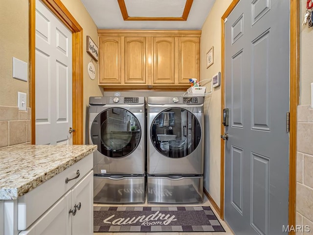 4184 Red Field Dr, Swansea, IL 62226 - laundry room featuring cabinet space and independent washer and dryer