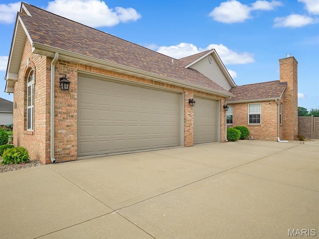 4184 Red Field Dr, Swansea, IL 62226 - view of front of home with concrete driveway, brick siding, a shingled roof, and a garage