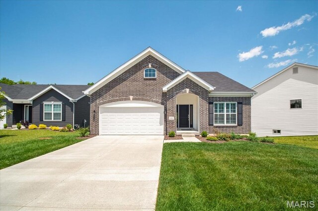 111 Creek Haven Ct, Lake St Louis, MO 63367 - view of front of property featuring brick siding, a garage, driveway, and a front yard