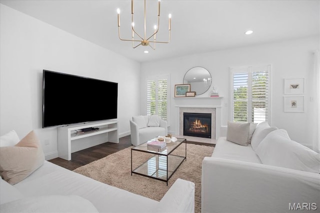 111 Creek Haven Ct, Lake St Louis, MO 63367 - living room with healthy amount of natural light, wood finished floors, recessed lighting, a chandelier, and a fireplace with flush hearth