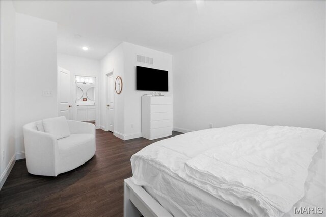 111 Creek Haven Ct, Lake St Louis, MO 63367 - bedroom with dark wood-style flooring, baseboards, recessed lighting, and ensuite bath