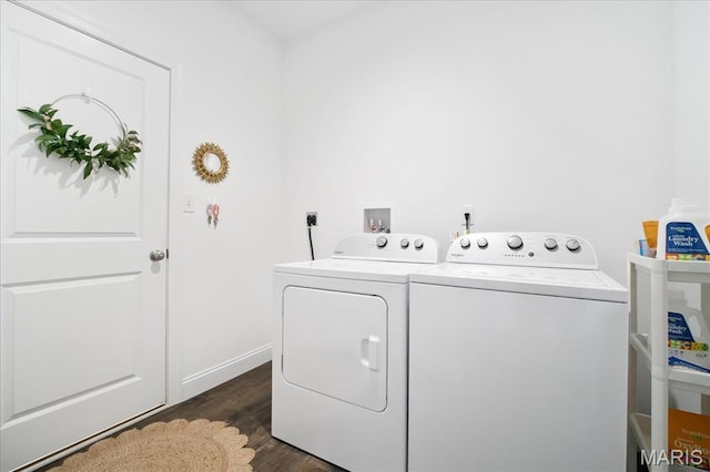 111 Creek Haven Ct, Lake St Louis, MO 63367 - laundry room featuring washing machine and dryer, dark wood-type flooring, and baseboards
