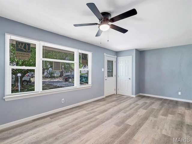 1216 Redman Blvd, Saint Louis, MO 63138 - empty room with wood finished floors and ceiling fan