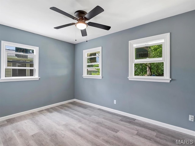 1216 Redman Blvd, Saint Louis, MO 63138 - spare room featuring wood finished floors and a ceiling fan