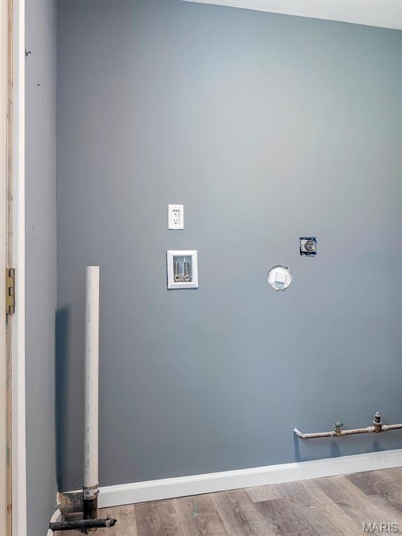 1216 Redman Blvd, Saint Louis, MO 63138 - laundry room featuring washer hookup and wood finished floors
