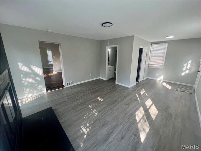 2328 Rockdale Ave, Saint Louis, MO 63121 - spare room with wood finished floors and baseboards