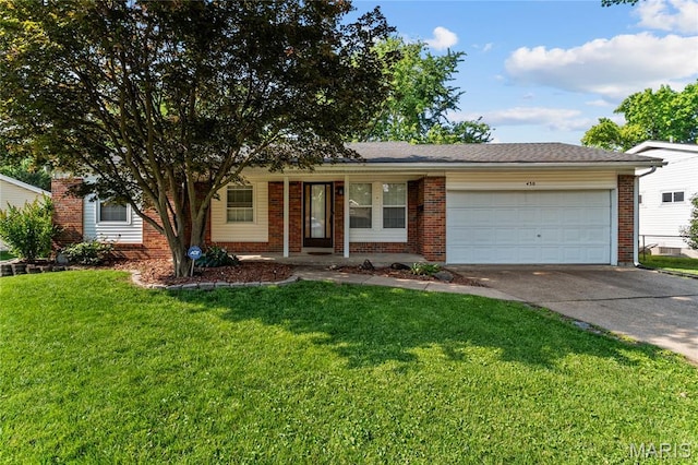 430 Coachway Ln, Hazelwood, MO 63042 - single story home featuring brick siding, concrete driveway, a garage, and a front yard