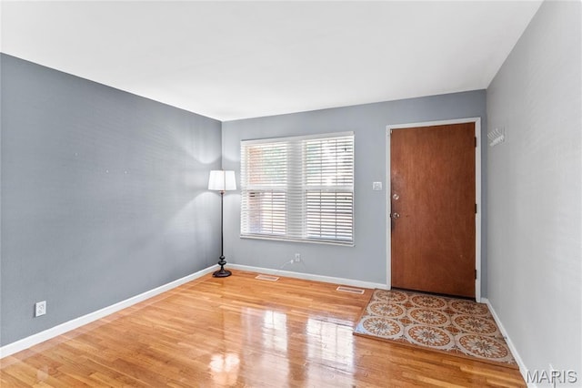 430 Coachway Ln, Hazelwood, MO 63042 - foyer entrance with wood finished floors and baseboards