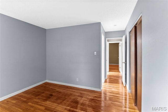 430 Coachway Ln, Hazelwood, MO 63042 - unfurnished room featuring wood finished floors