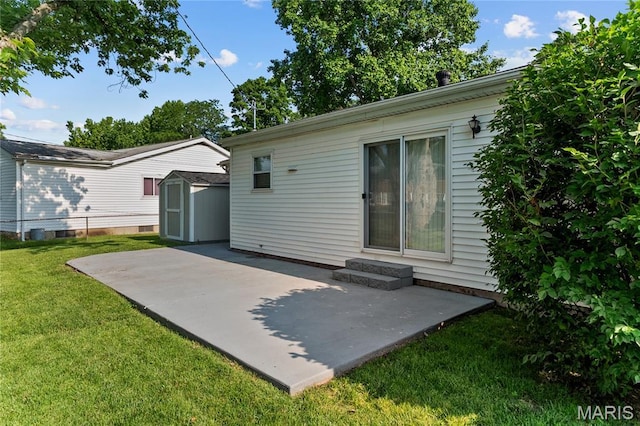 430 Coachway Ln, Hazelwood, MO 63042 - back of property with a patio area, a shed, and a yard