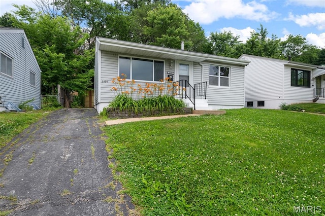 2604 Tamm Ave, Saint Louis, MO 63139 - view of front of property featuring a front yard and asphalt driveway