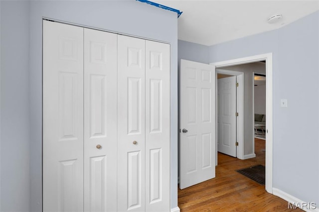 2604 Tamm Ave, Saint Louis, MO 63139 - corridor featuring light wood-style flooring and baseboards
