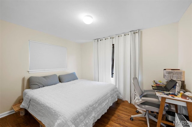 2604 Tamm Ave, Saint Louis, MO 63139 - bedroom featuring wood finished floors and an office area