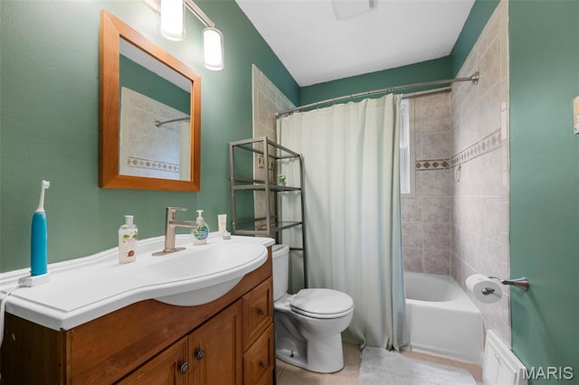 2604 Tamm Ave, Saint Louis, MO 63139 - bathroom featuring vanity, shower / bath combo with shower curtain, and tile patterned flooring