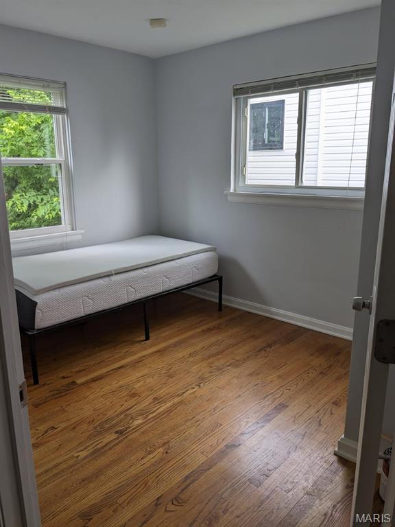 2604 Tamm Ave, Saint Louis, MO 63139 - bedroom with wood finished floors and baseboards