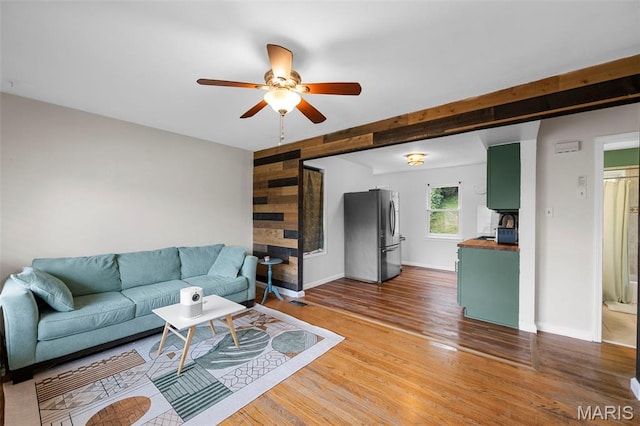 2604 Tamm Ave, Saint Louis, MO 63139 - living room with ceiling fan and light wood-style flooring