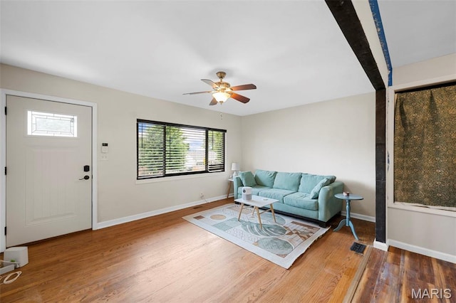 2604 Tamm Ave, Saint Louis, MO 63139 - living area featuring wood finished floors and a ceiling fan