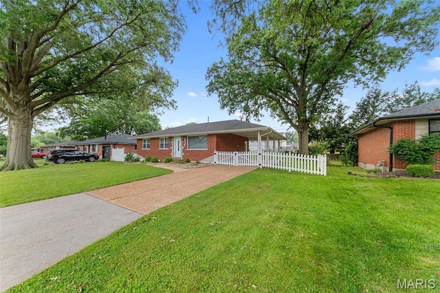 4620 Kramer Dr, Saint Louis, MO 63123 - view of front of home with brick siding and driveway