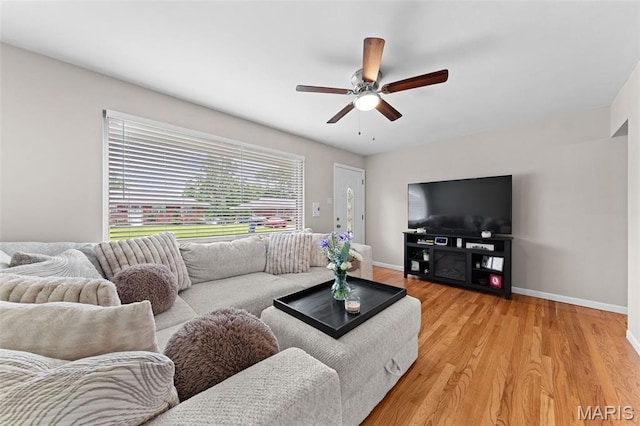4620 Kramer Dr, Saint Louis, MO 63123 - living area with light wood finished floors and a ceiling fan