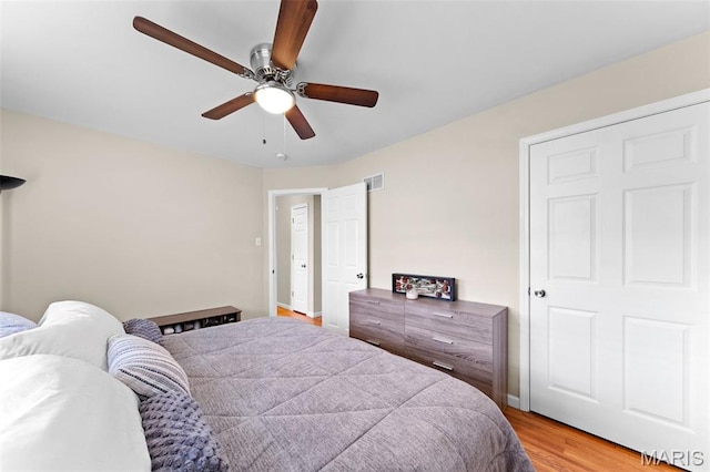 4620 Kramer Dr, Saint Louis, MO 63123 - bedroom with light wood finished floors and ceiling fan