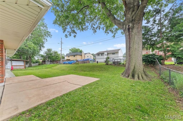 4620 Kramer Dr, Saint Louis, MO 63123 - fenced backyard with a patio area and a residential view