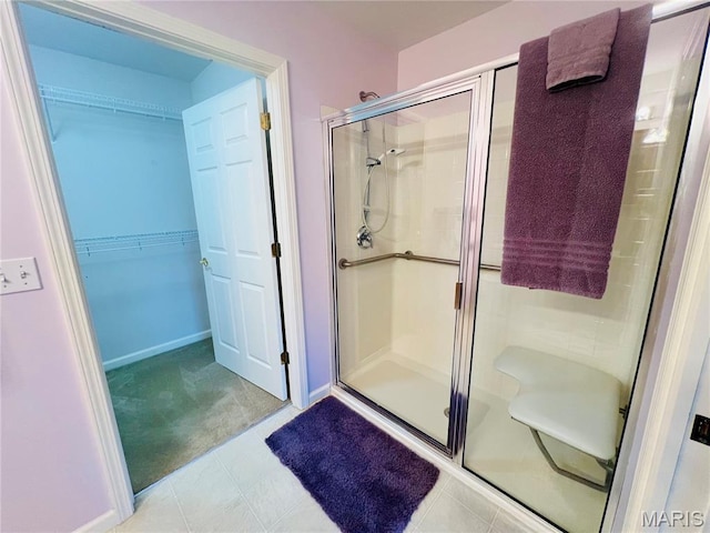 305 Hawk Nest Ct, Union, MO 63084 - bathroom with a shower stall and a walk in closet