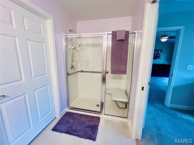 305 Hawk Nest Ct, Union, MO 63084 - full bathroom featuring a shower stall, tile patterned flooring, and ceiling fan