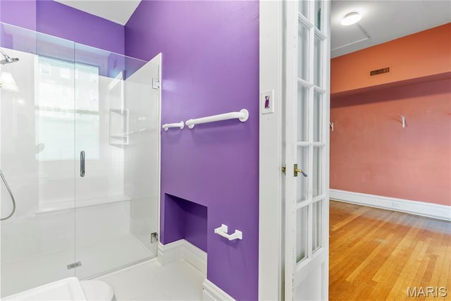 10 N Kingshighway Blvd Unit 2Cs, Saint Louis, MO 63108 - full bath featuring a shower stall and wood finished floors