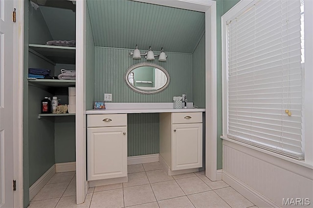 1425 Perryville Cpe, Girardeau, MO 63701 - bathroom featuring tile patterned flooring, vanity, baseboards, and a closet
