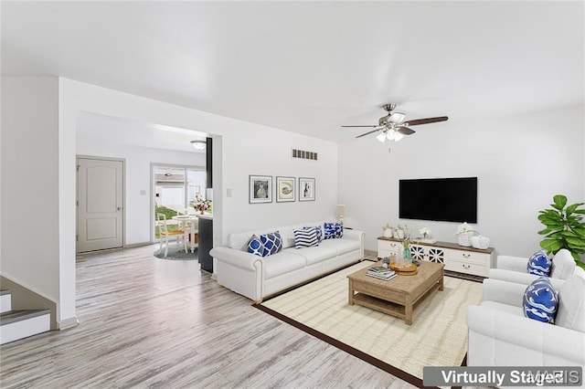 3101 Keelboat Xing, Saint Charles, MO 63301 - living area with wood finished floors and ceiling fan