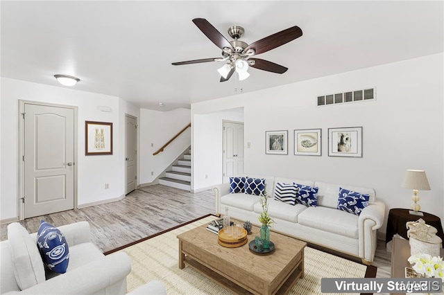 3101 Keelboat Xing, Saint Charles, MO 63301 - living area with stairs, ceiling fan, and wood finished floors