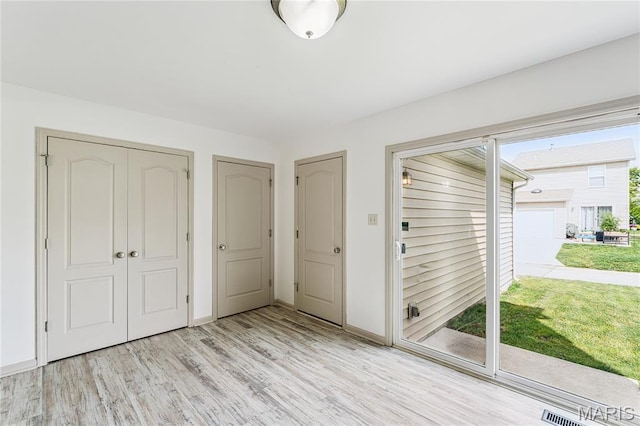 3101 Keelboat Xing, Saint Charles, MO 63301 - foyer entrance with light wood-style flooring and baseboards