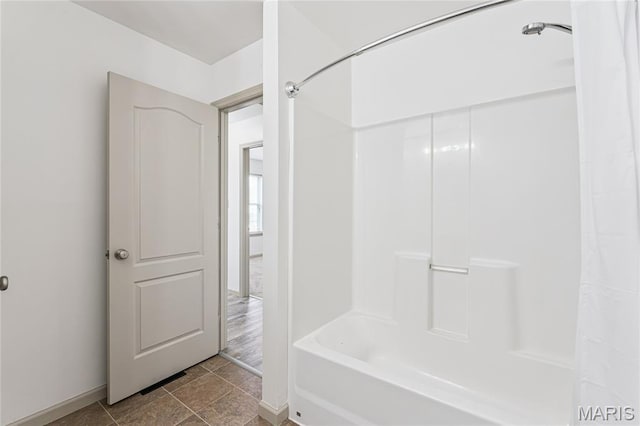 3101 Keelboat Xing, Saint Charles, MO 63301 - bathroom with shower / tub combo with curtain and baseboards