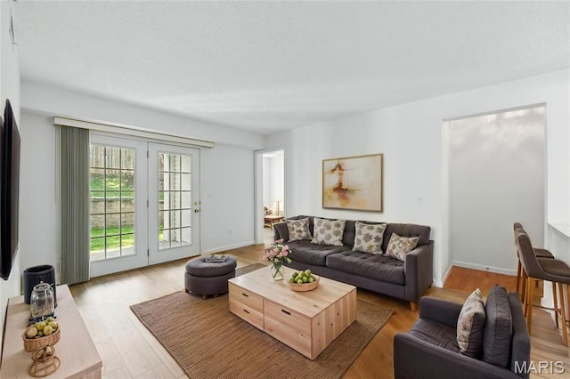 3425 Country Stone Manor Dr Unit G, Valley Park, MO 63088 - living room with light wood-style floors and baseboards
