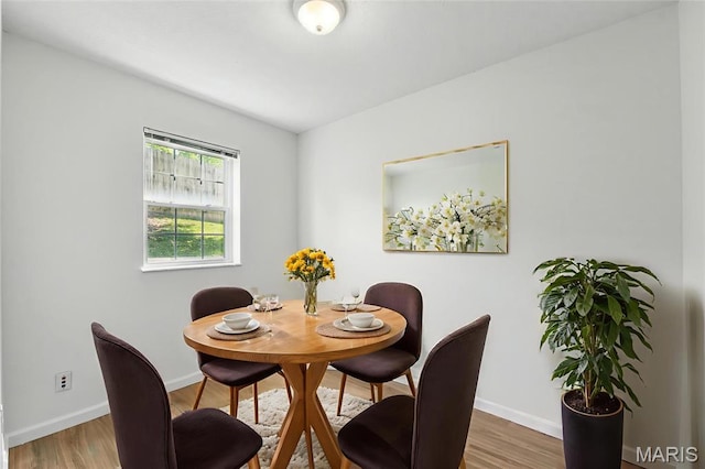 3425 Country Stone Manor Dr Unit G, Valley Park, MO 63088 - dining room with baseboards and wood finished floors
