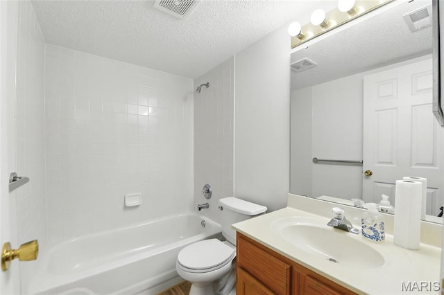 3425 Country Stone Manor Dr Unit G, Valley Park, MO 63088 - bathroom featuring vanity,  shower combination, and a textured ceiling