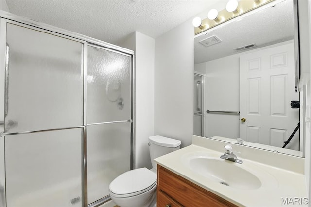 3425 Country Stone Manor Dr Unit G, Valley Park, MO 63088 - full bathroom with vanity, a stall shower, and a textured ceiling