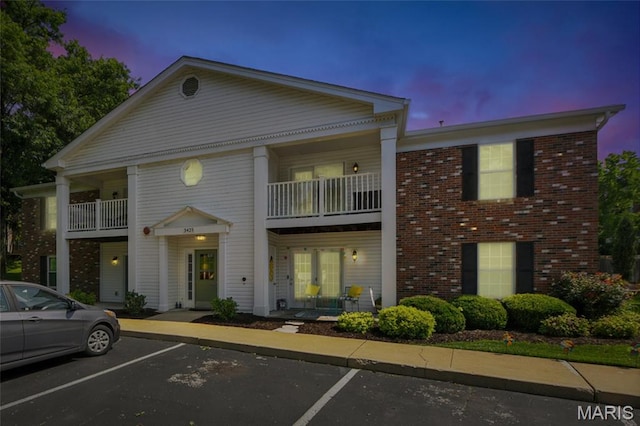 3425 Country Stone Manor Dr Unit G, Valley Park, MO 63088 - greek revival inspired property with a balcony, uncovered parking, and brick siding