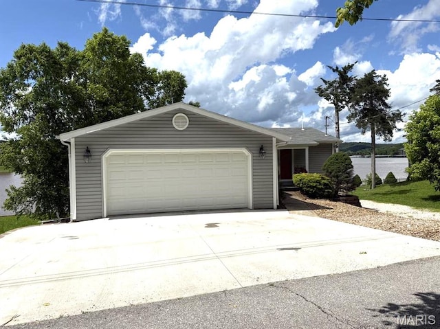63 Rock Dove Ln, Camdenton, MO 65020 - view of front of house featuring concrete driveway and an attached garage
